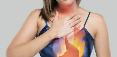 Stomach On Woman's Body Against White Background, Acid Reflux Disease Symptoms Or Heartburn, Concept With Healthcare And Medicine